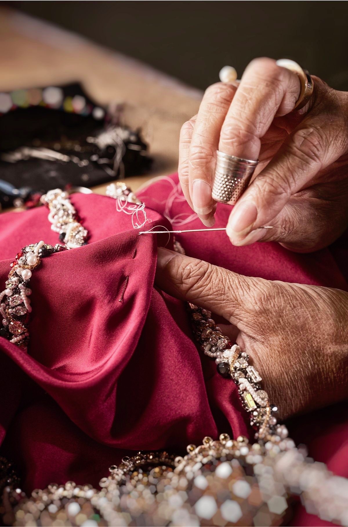 Hand-beaded by the atelier